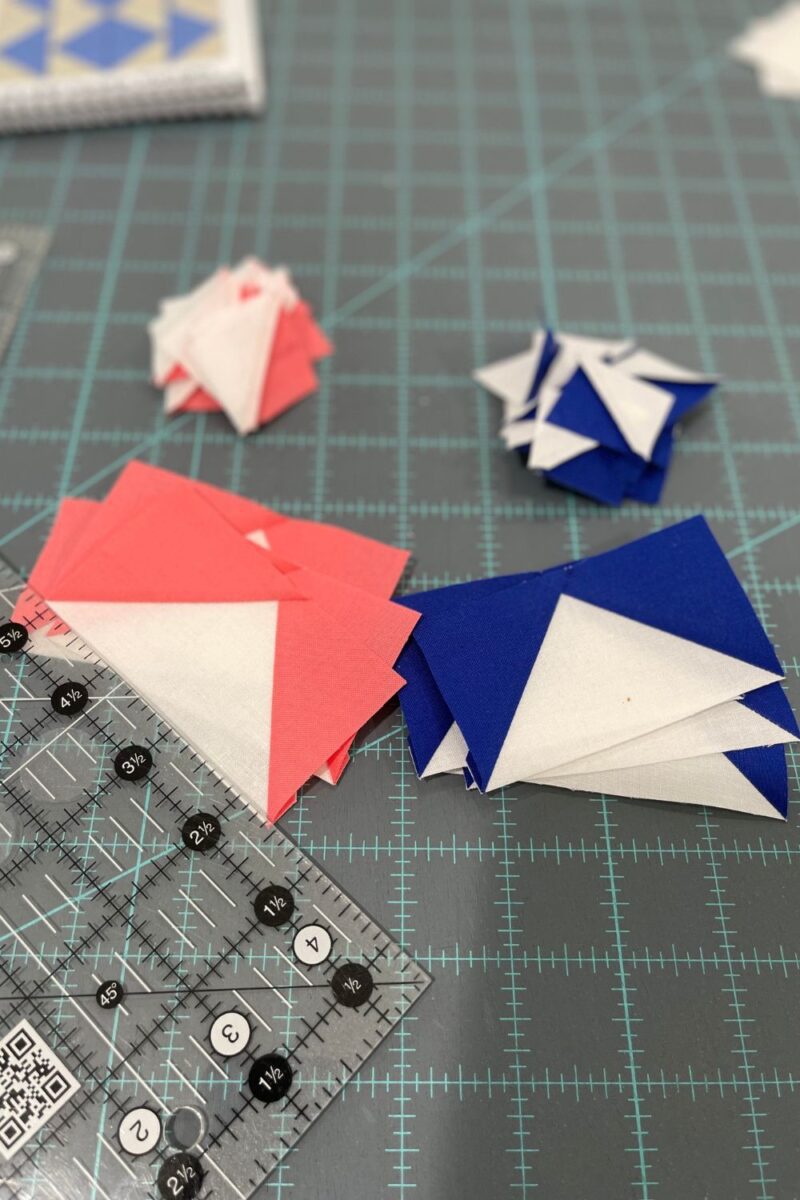 Primitive Gatherings Twilight Stars Quilt Along flying geese and half square triangle blocks.