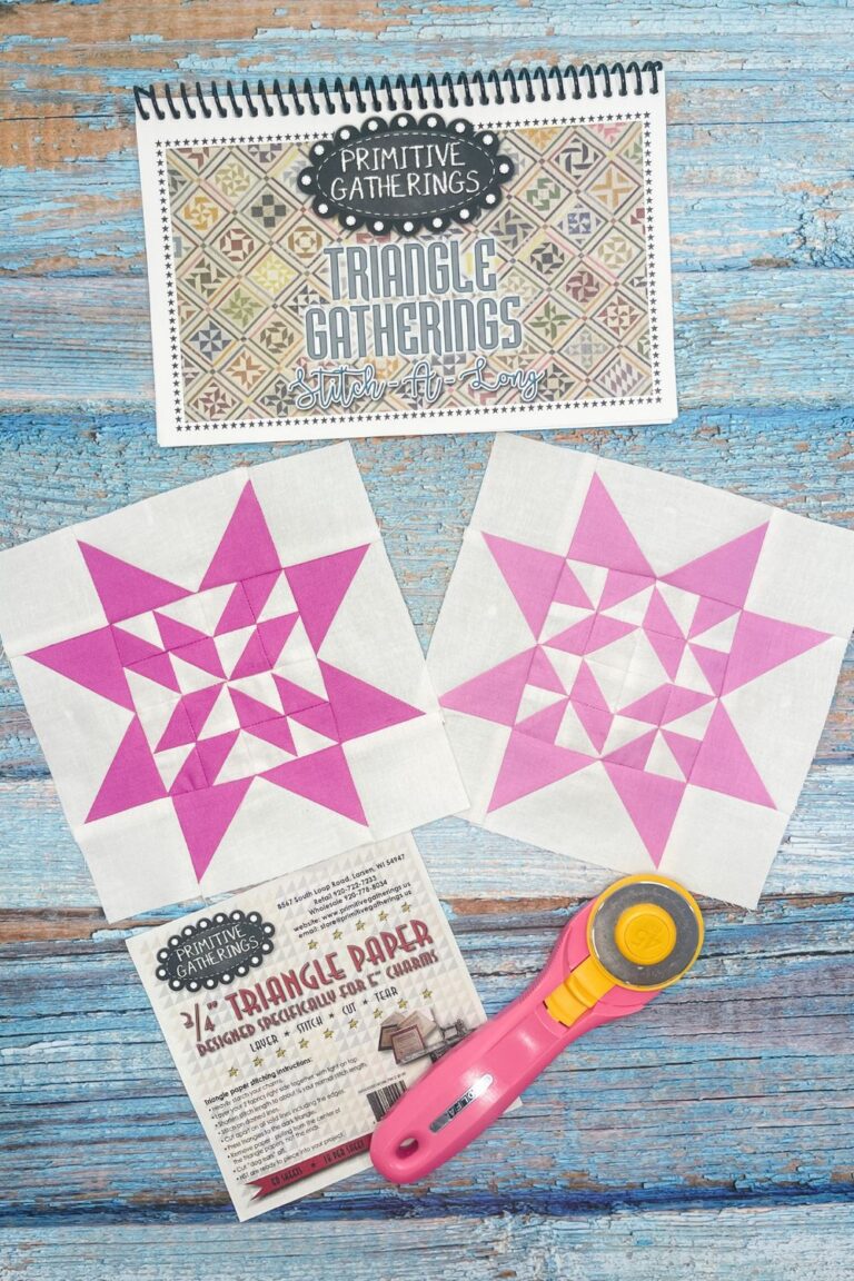 Twilight Stars QAL week 11 quilt blocks. The blocks are made of half square triangles offset by flying geese and corner blocks in white and purple.