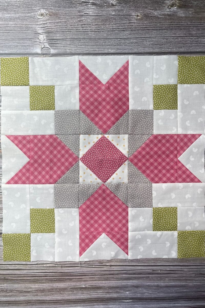 Farmer's Star quilt block featuring fabric from Renew and Spring Chicken by Sweetwater in colors green, grey, pink, and white.