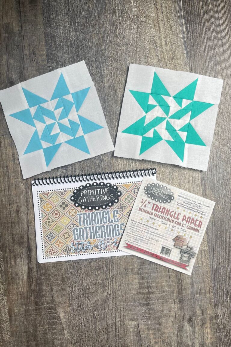 Triangle Gatherings quilt book with blocks number 5 and 8. Blocks are made with Free Spirit solids and white Bella fabric.