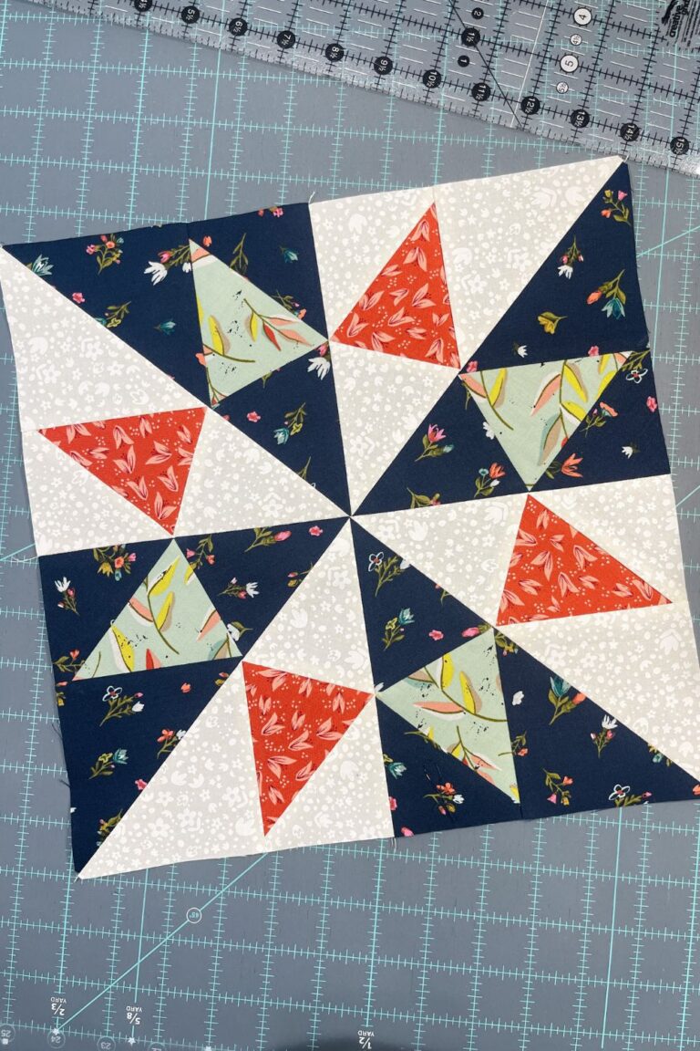 Blockheads 5 block 3. A paper pieced block made with Songbook fabrics and designed by Brigitte Heitland of Zen Chic