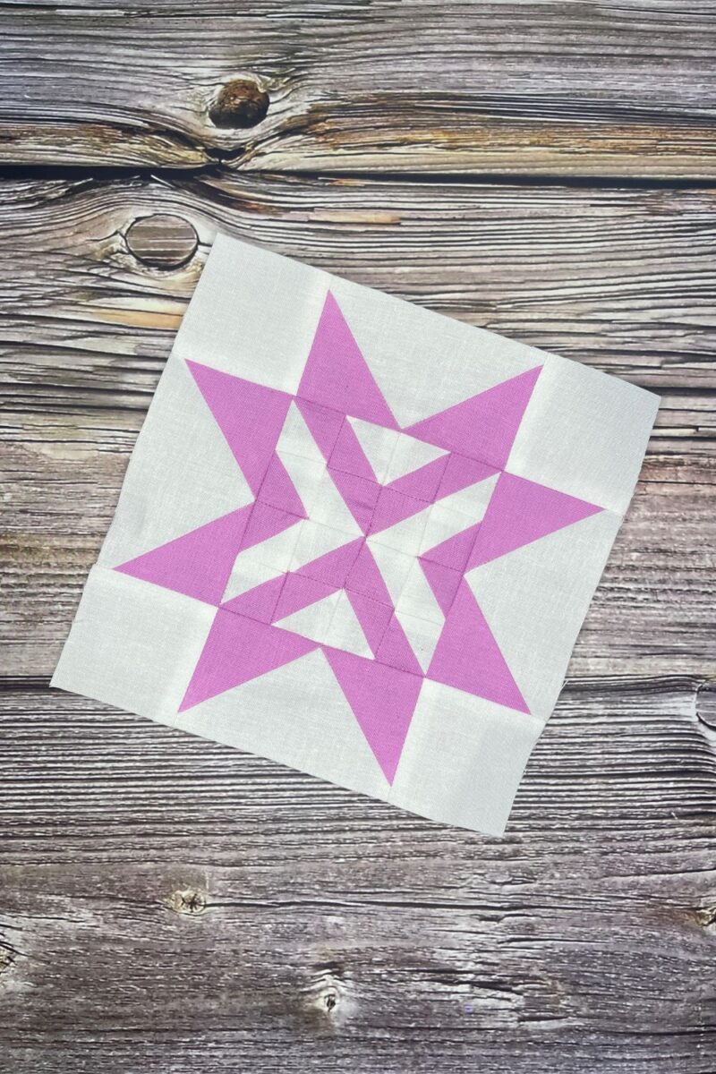 Triangle Gatherings block 91 in the twilight stars quilt along setting in lilac