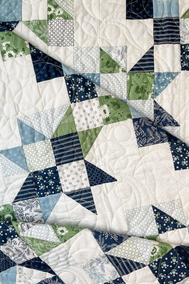 Completed Star Streams scrappy quilt made with Nantucket Summer fabric