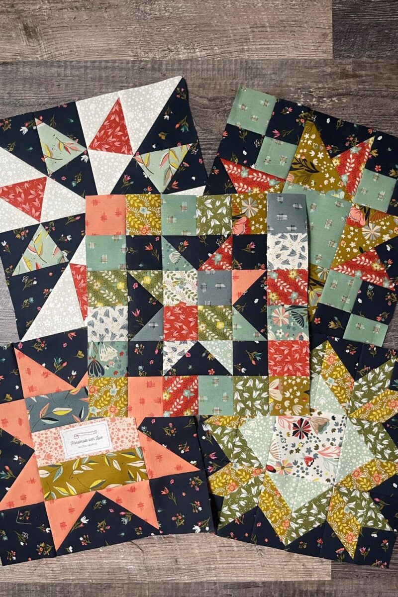 Moda Blockheads 5 2023 progress photo of 5 quilt blocks in Songbook fabric collection.