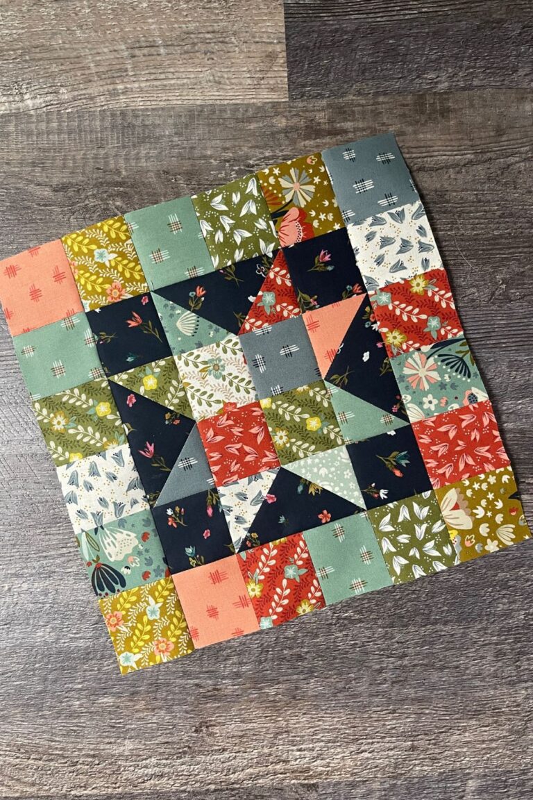 Completed super scrappy star block designed by Corey Yoder for Moda Blockheads 5 Block 4. Fabric is Songbook by Fancy That Design House