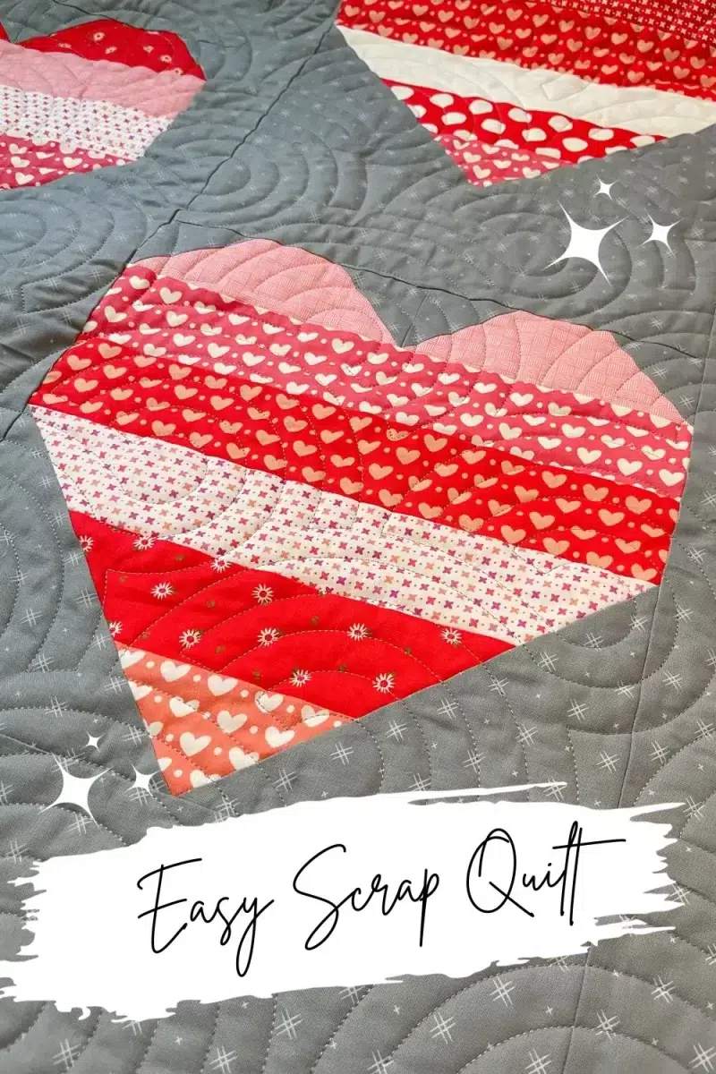 Easy Scrap quilt with heart blocks made with 2.5" strips of Sincerely Yours.