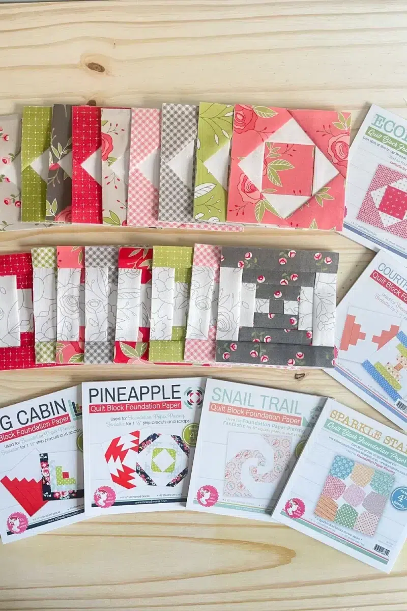Quilt blocks made with foundation paper piecing. Economy. blocks and courthouse steps blocks in red, pink, grey, and green color ways.