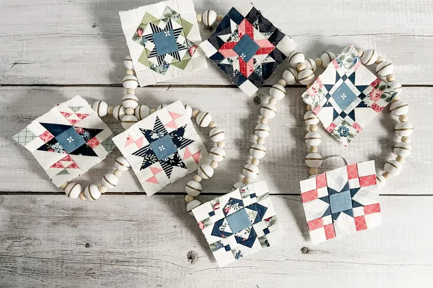 7 mini quilt blocks for the quilt along so far. These are 3.5 inch blocks of the original patterns each month.