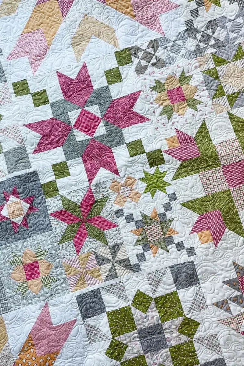 Star blocks assembled into the barn star sampler quilt.