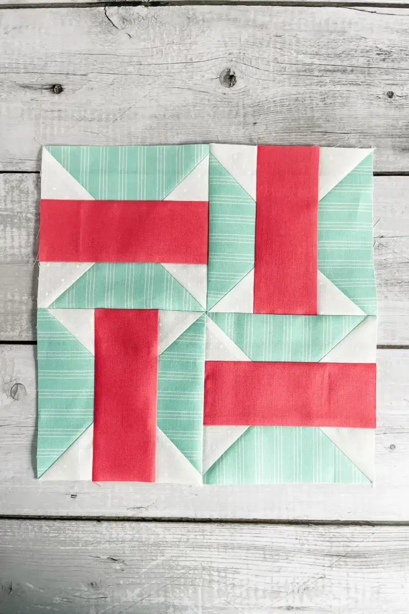 4 patch butterfly quilt block in pink and aqua