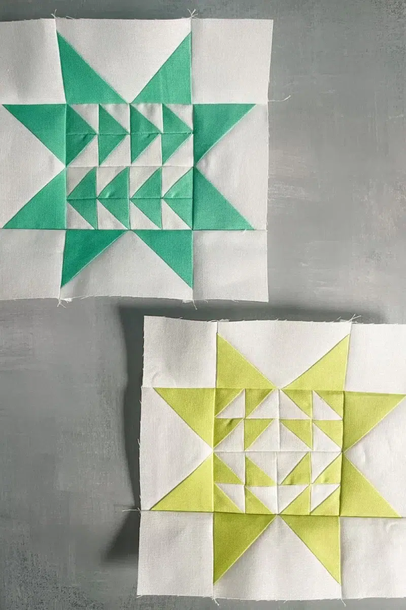 2 quilt blocks from the Triangle Gatherings Quilt Book. Made up of 16 half square triangles in the center and flying geese star points. One block is green and white, the other is yellow and white.