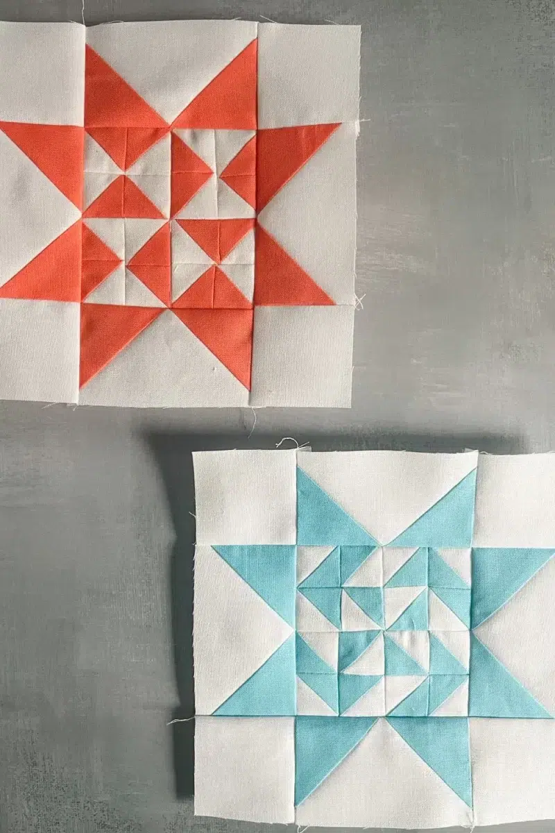 2 quilt blocks from the Triangle Gatherings Quilt Book. Made up of 16 half square triangles in the center and flying geese star points. One block is orange and white, the other is aqua and white.