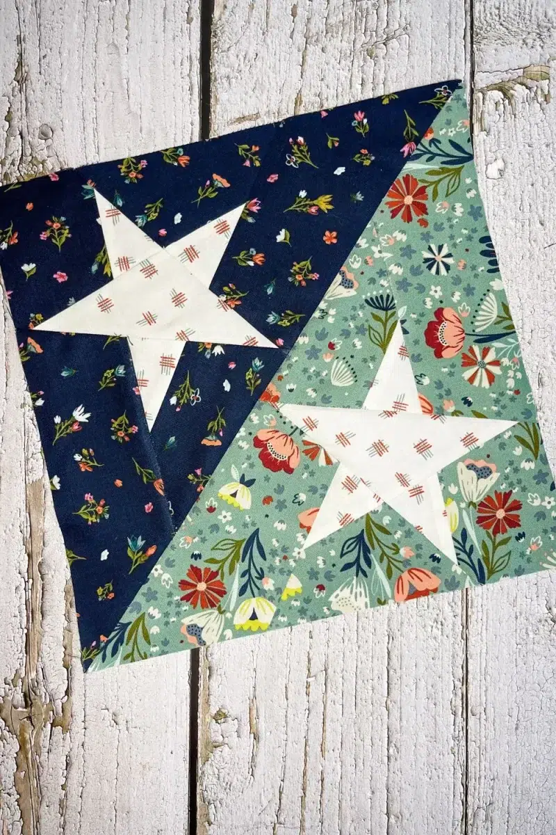 Blockheads 5 Block 9 is a paper pieced block with two stars in a larger half square triangle block