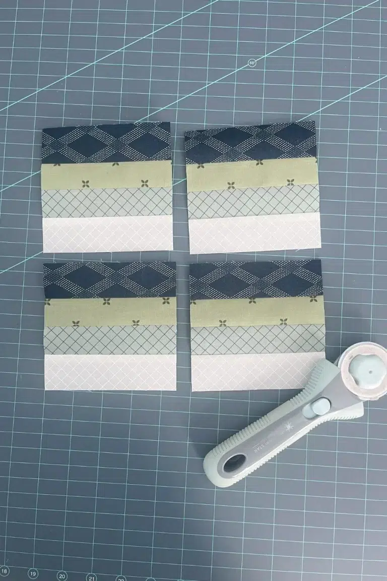 4 perfectly trimmed strip pieced quilt blocks