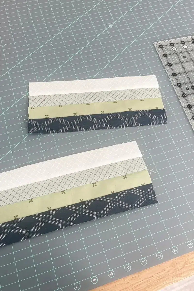Two strip sets of fabric ready to be cut to size.