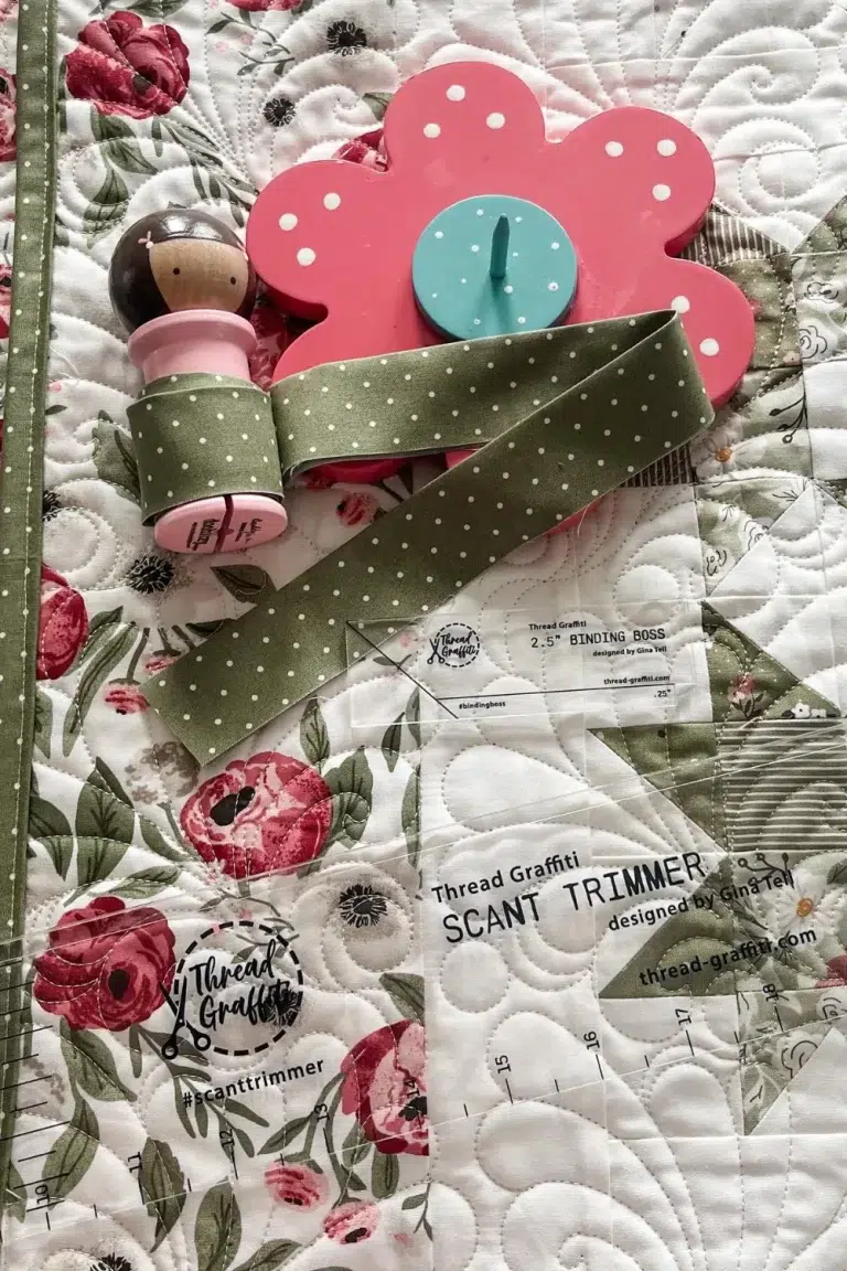 Essential Binding Tools: Binding Babies, Scant Trimmer, and Binding Boss.