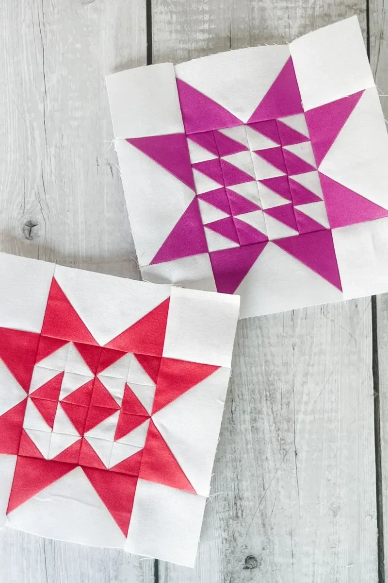 Two quilt blocks for the Twilight Stars Quilt Along. One red and white and the other is purple and white. Uses half square triangles arranged to make the center and flying geese and corner squares to complete the quilt block.
