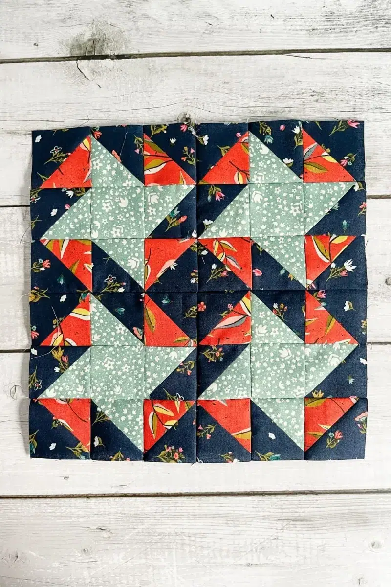 Moda Blockheads 5 group 2 block 2. The All Stars block made with Fancy That Design House's fabric collection Songbook.