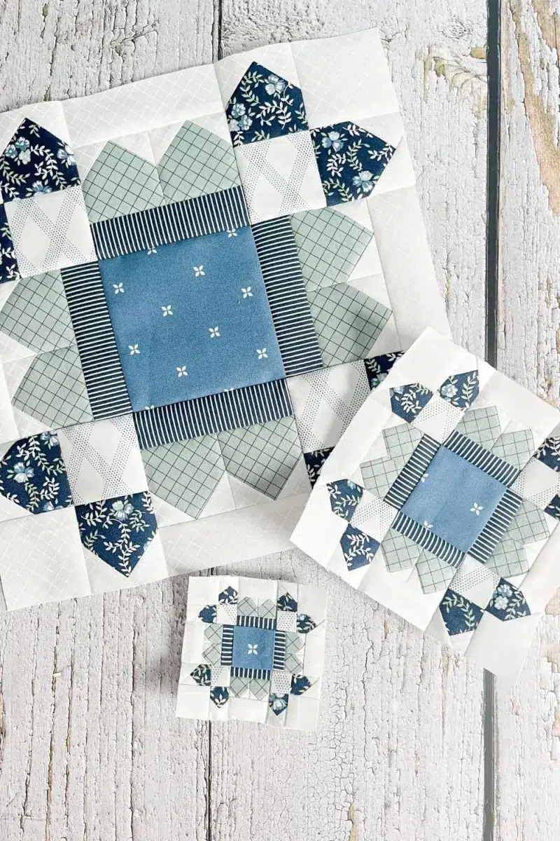 Three Crocus Quilt blocks in 12 inch, 6 inch, and 3 inch sizes