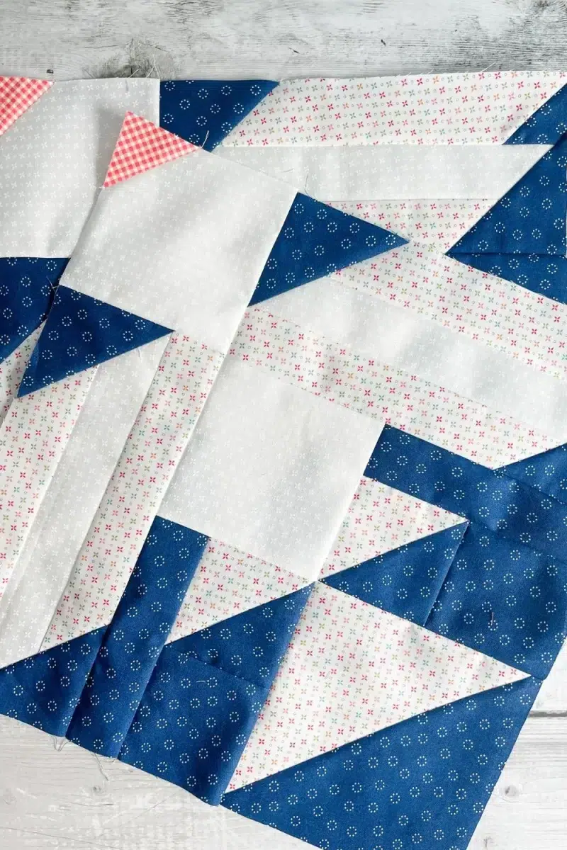 Two dove quilt blocks. Made with Strawberry Lemonade fabrics by Sherri and Chelsi