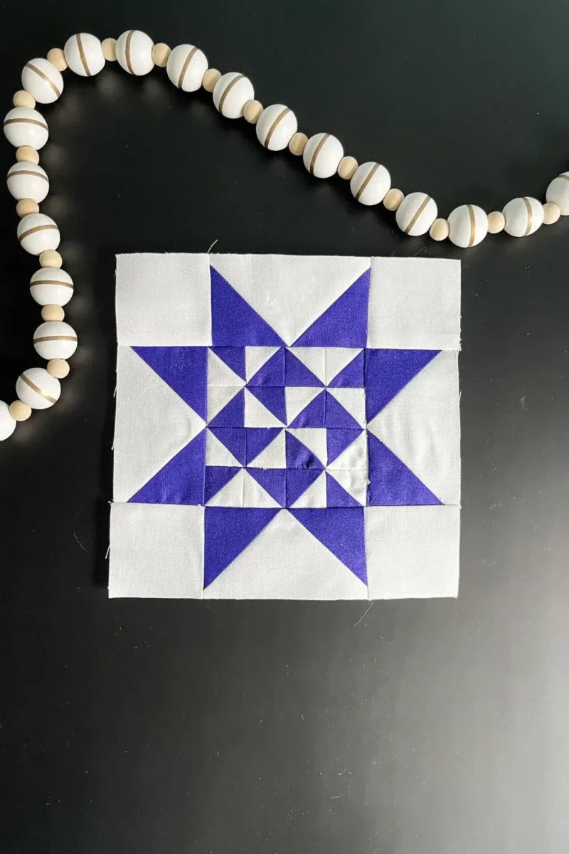Purple and white quilt block for Twilight Stars #95