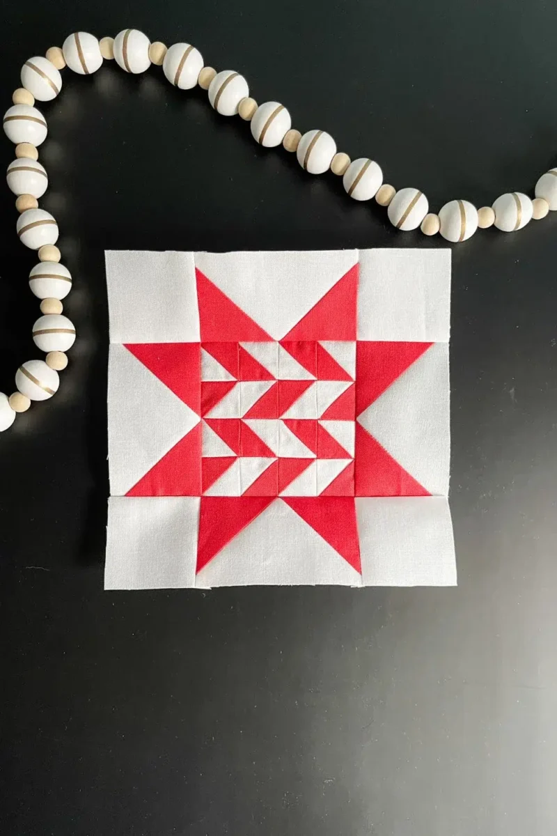 Red and white quilt block for Twilight Stars #60