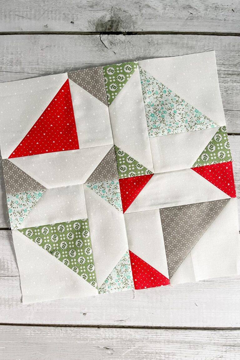 Neighborhood quilt block made with half square triangle units and rectangles with sew and flip corners.