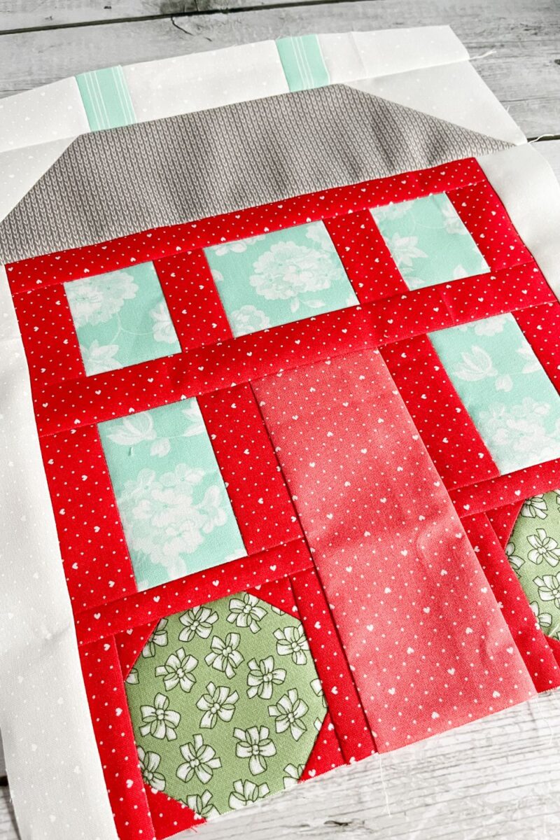 The Home Again block is a house shaped quilt block