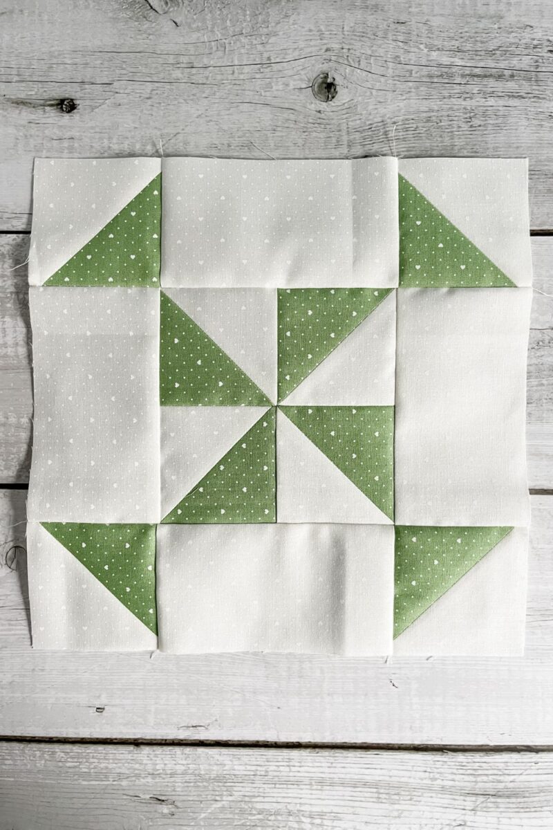 The Flutter quilt block has a pinwheel center made up with half square triangle units and hst corners.
