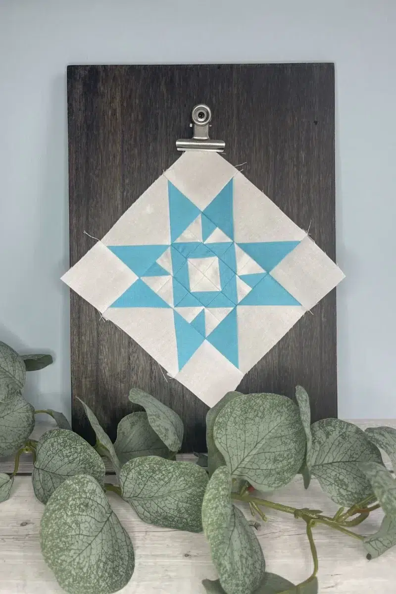 Triangle Gatherings book pattern 40 in white and blue fabrics.