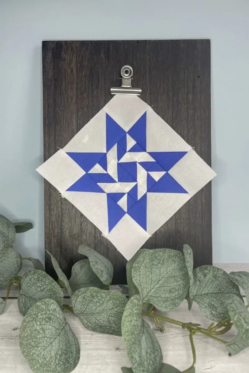 Triangle Gatherings book pattern 34 in white and blue fabrics.