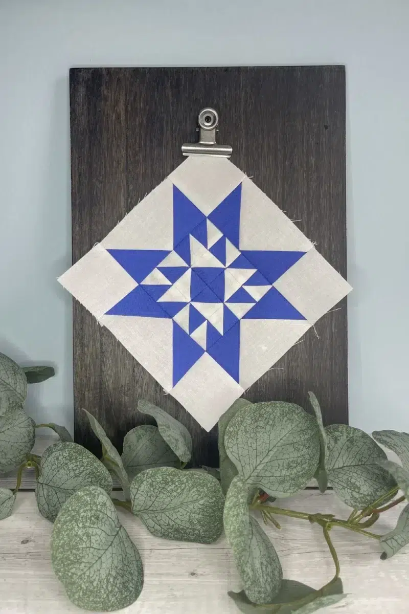 Triangle Gatherings book pattern 20 in white and blue fabrics.