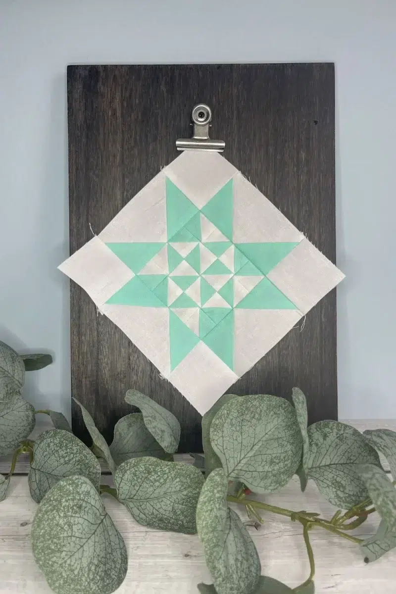 Triangle Gatherings book pattern 25 in white and teal fabrics.