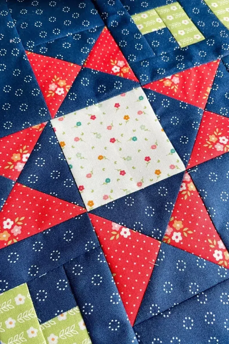Close up of the Ohio Star quilt block. Made with hour glass quilt squares.