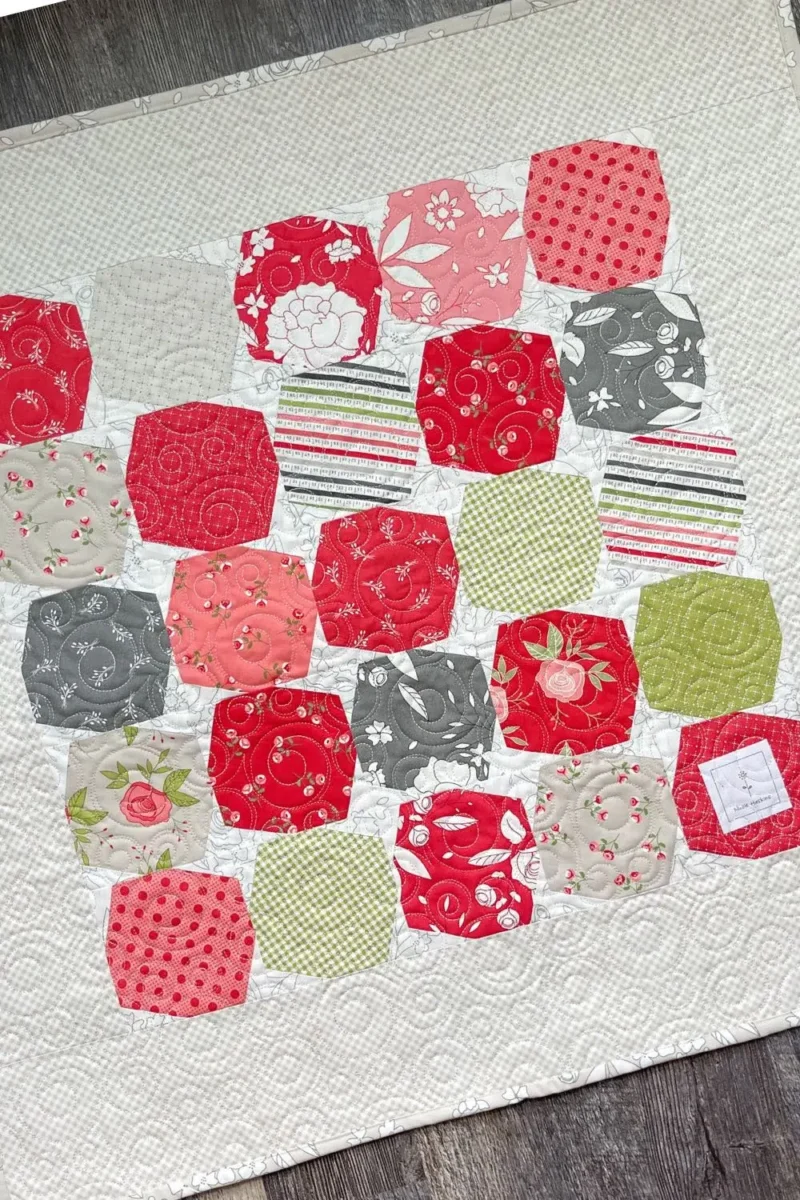 Backing of the Petit Four quilt made up of 25 Sparkle Star quilt blocks.