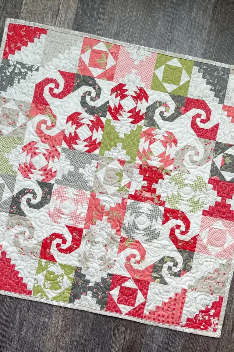 Front of the finished Petit Four quilt. Made with 6 different foundation paper pieced block types.