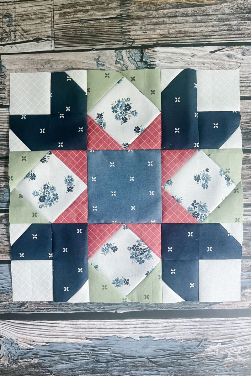 Four square in a square quilt block units and star point corners make up the Daffodil quilt block