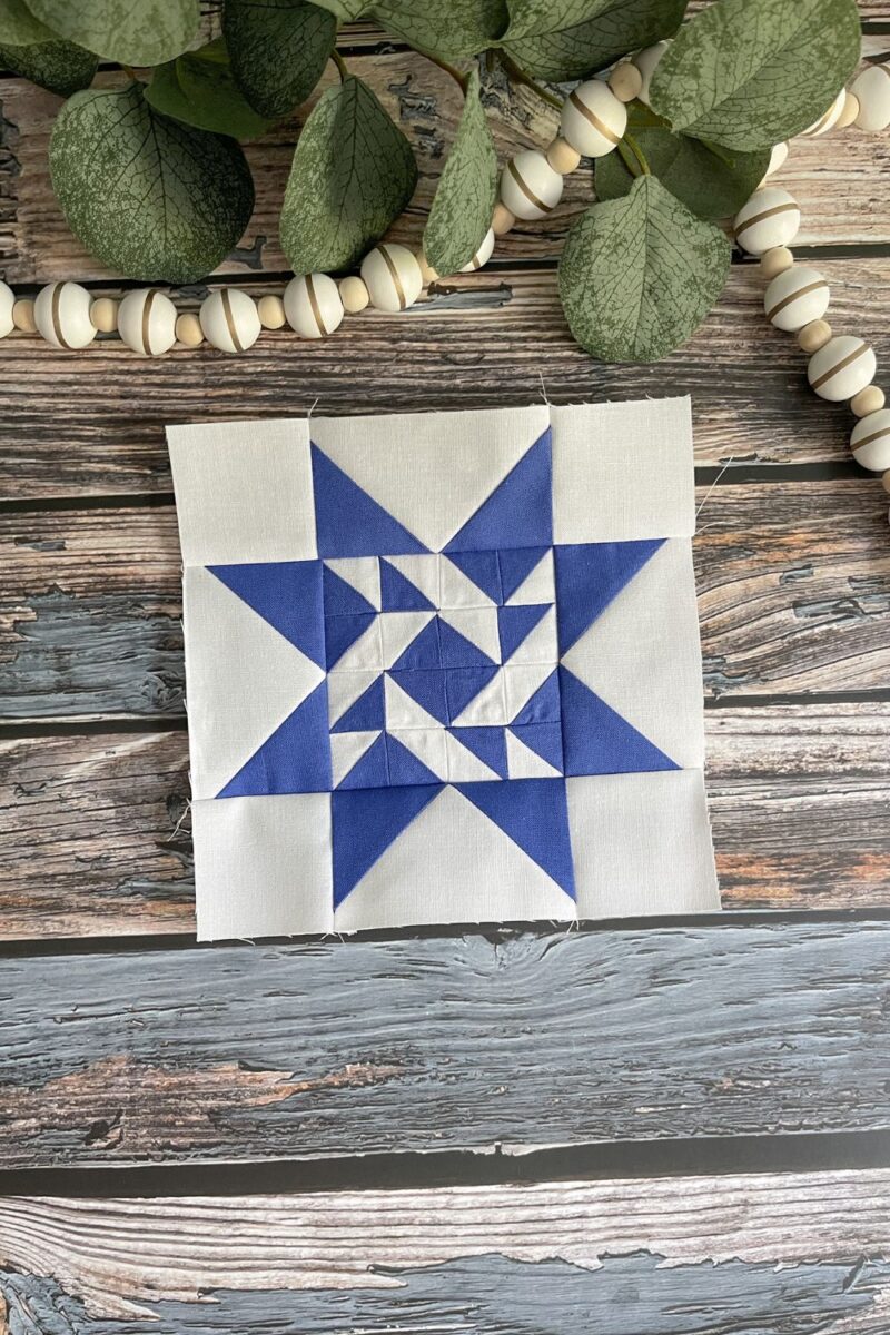 Twilight Stars block 75 in blue and white fabrics.