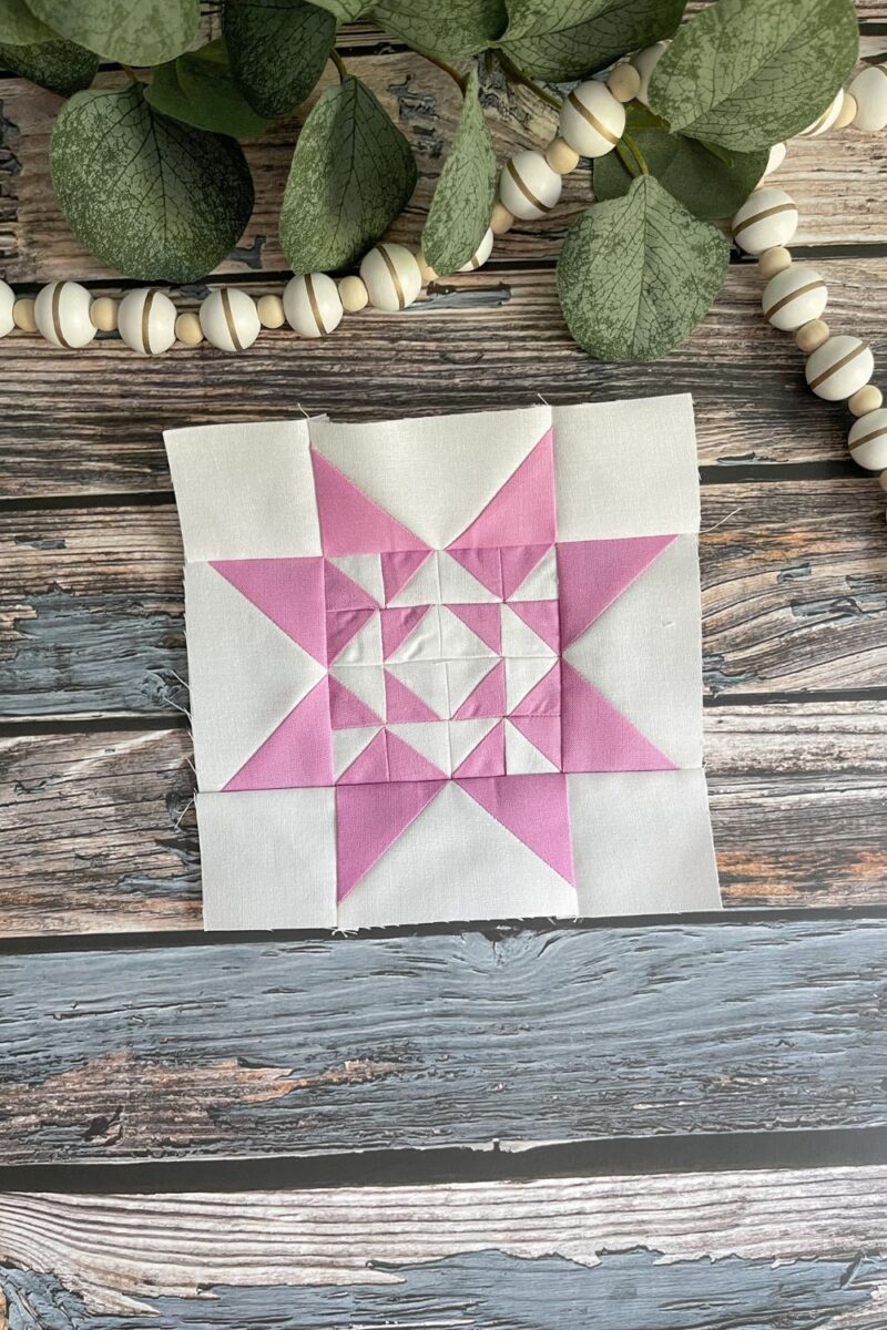 Twilight Stars quilt block number 46 in lilac and white