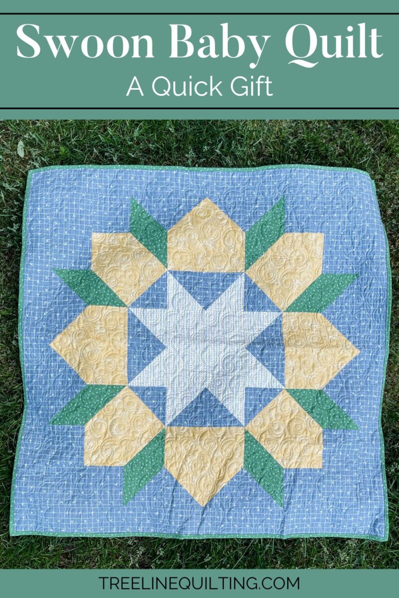 Cover image for the Swoon Baby quilt in grey, green, and yellow star.