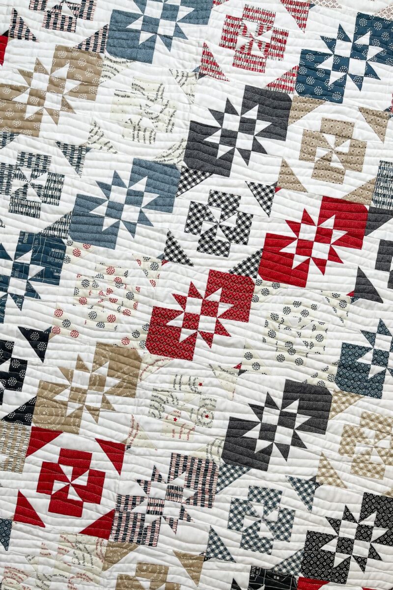Close up view of the two disappearing nine patch blocks of the Twist and Turn quilt.