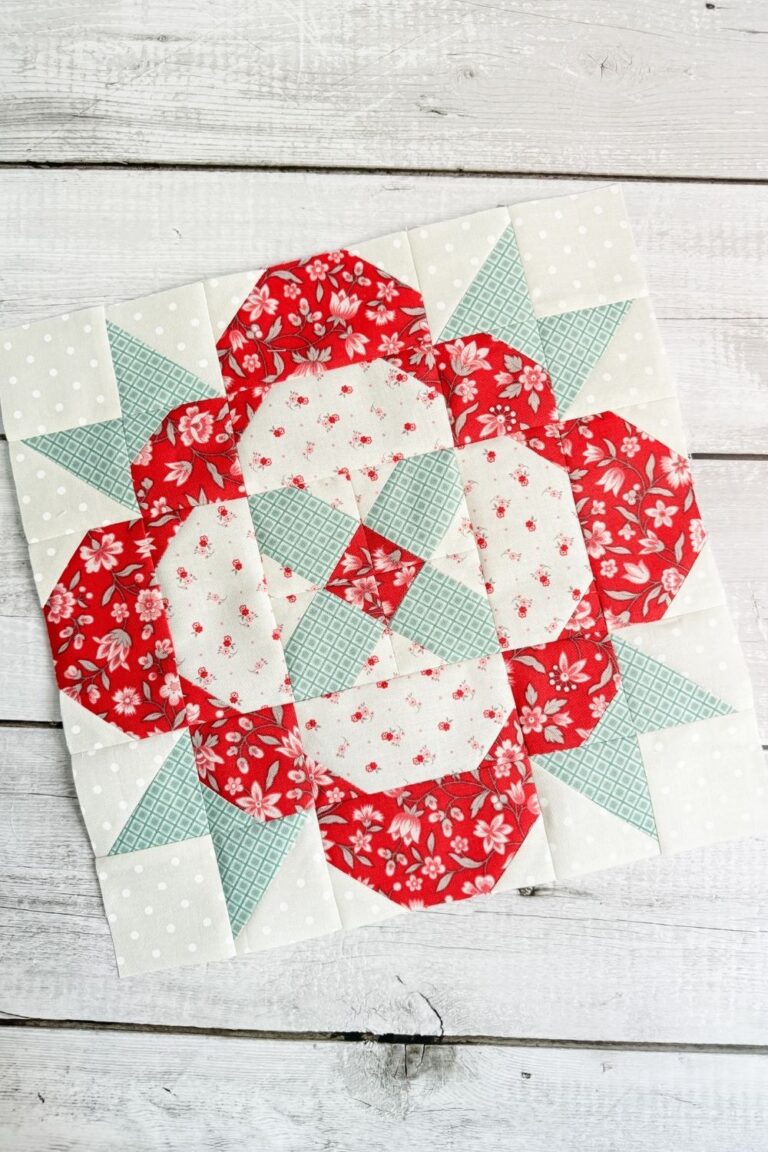 Angled picture of the details of the Happiness Blooms quilt block