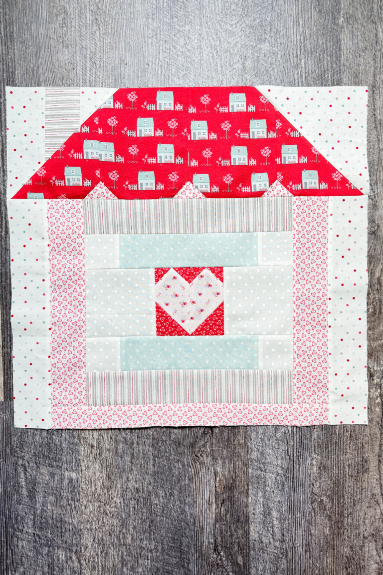 Completed block 1 of the 2024 Designer Mystery Quilt Along in a house block setting