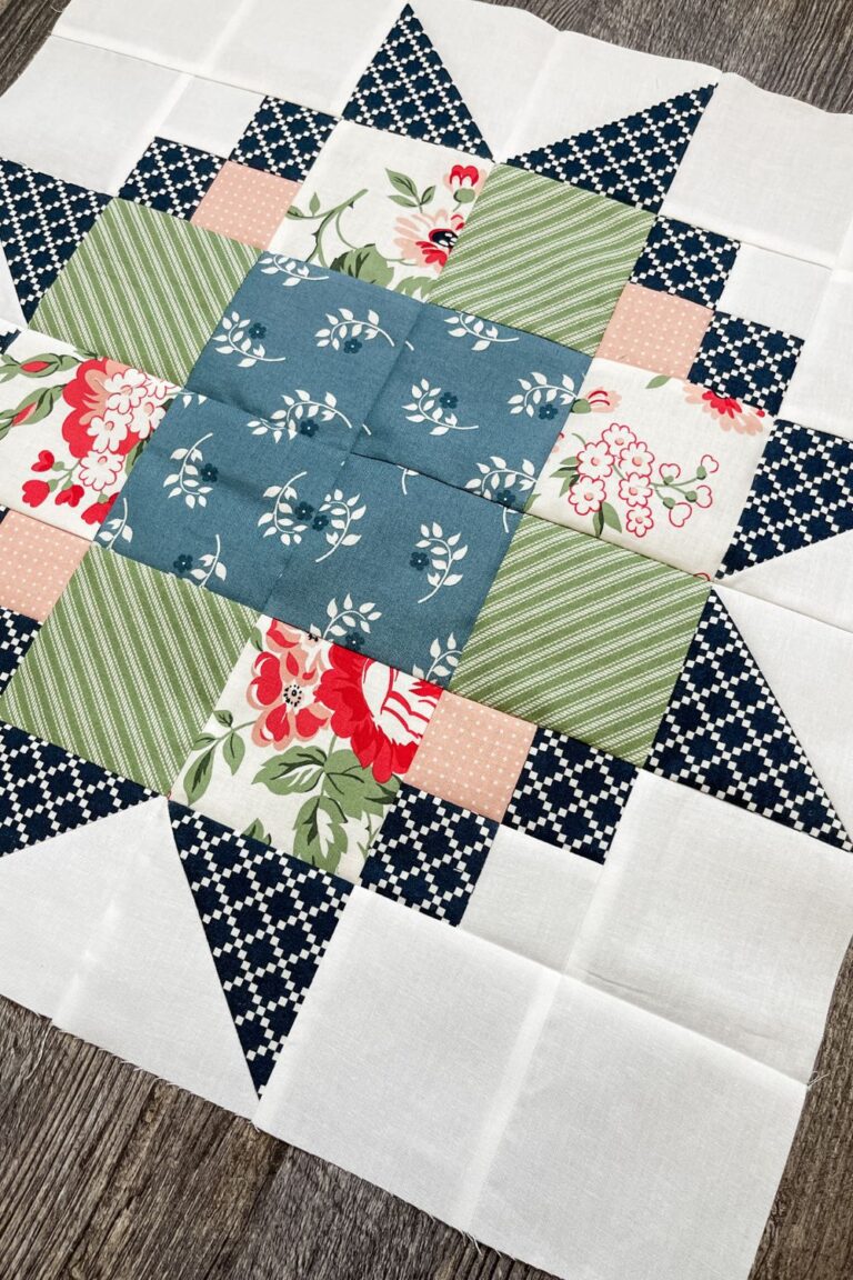 The 4 Evening Hourglass blocks sewn together to create a larger star quilt block