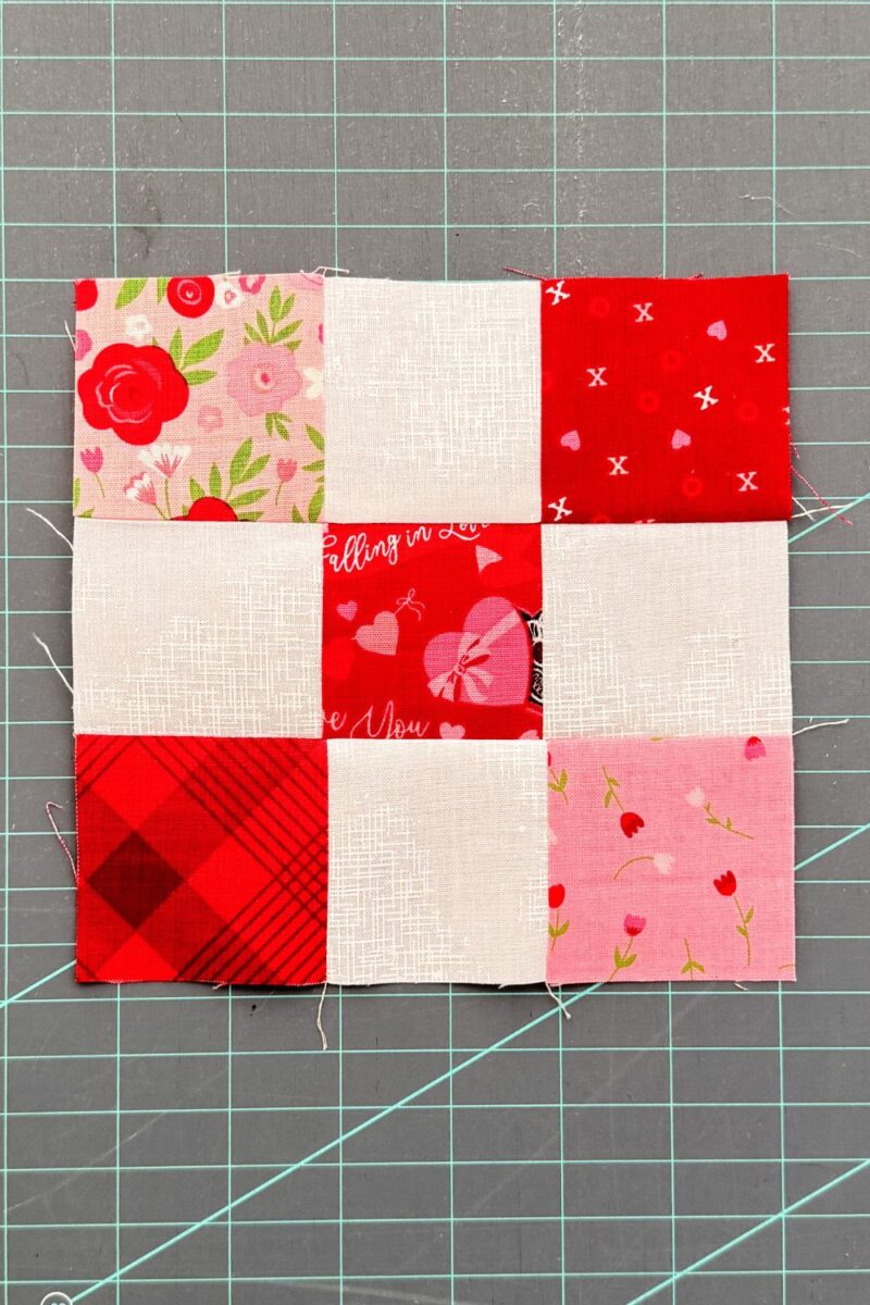 Pressing quilt blocks in alternating directions to lay flat