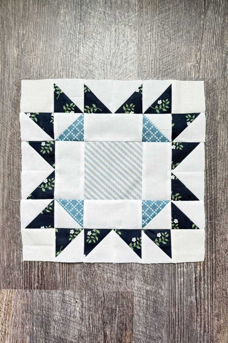 Arizona Quilt block made with half square triangle units and regular square and rectangle pieces.