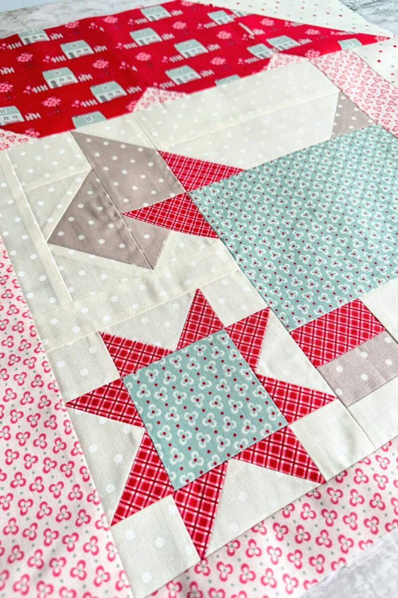 Close-up of the 'My Best Friend' quilt block featuring a Scottie dog with a bow tie and a star, created with My Summer House fabrics for a colorful, summery look.
