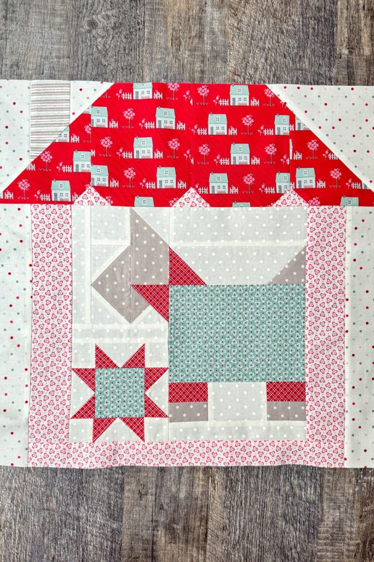 Pieced 'My Best Friend' quilt block featuring a Scottie dog in blue and white My Summer House fabrics, with added star and house elements as part of the Designer Mystery month 5 design.