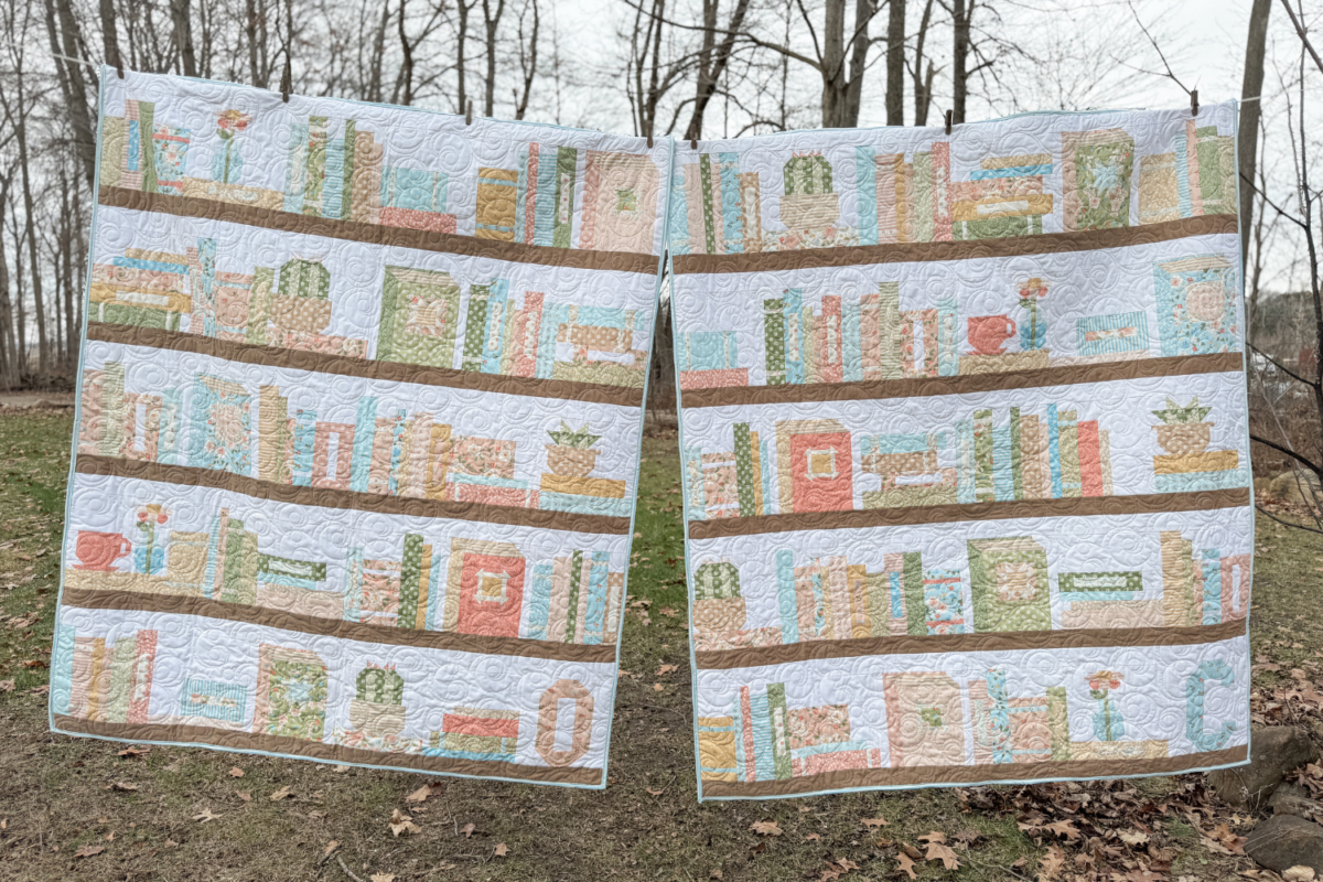 Two quilts side-by-side with bookshelf designs, personalized for Camryn and Olivia.