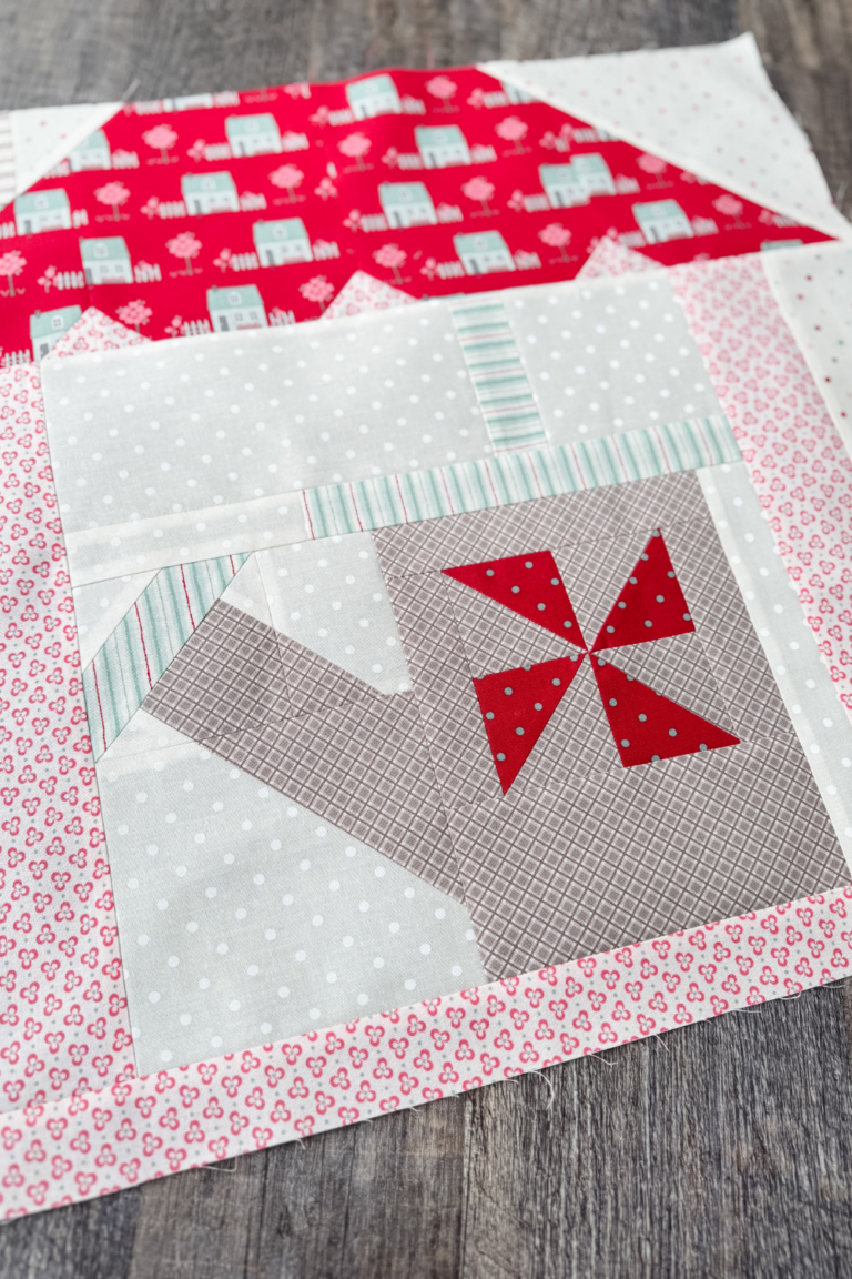 Garden & Grace quilt block in house setting as part of row assembly for quilt top.